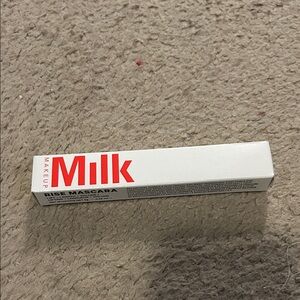 Milk Makeup Mascara in White with Red Text